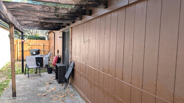 view of side of property with a pergola