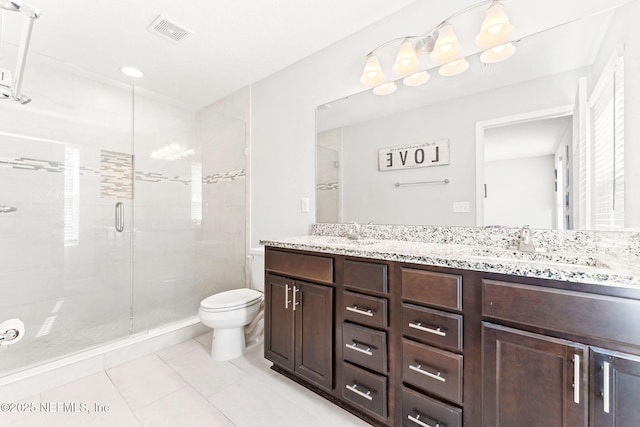 bathroom with vanity, an enclosed shower, tile patterned floors, and toilet