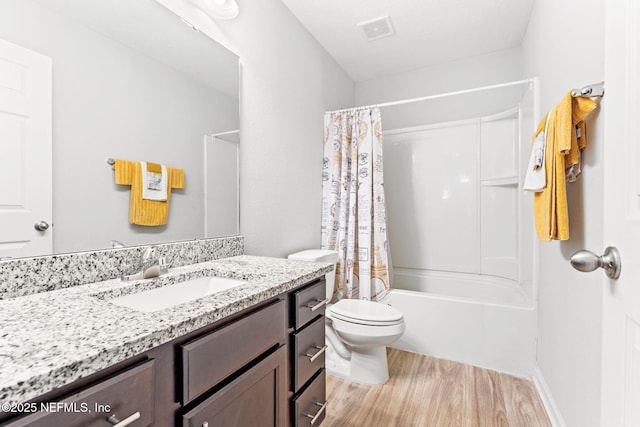 full bathroom with hardwood / wood-style flooring, vanity, toilet, and shower / bath combination with curtain