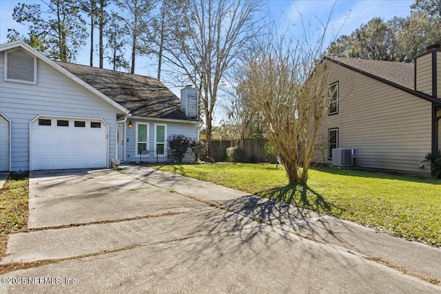 view of home's exterior with cooling unit, fence, driveway, a lawn, and a chimney