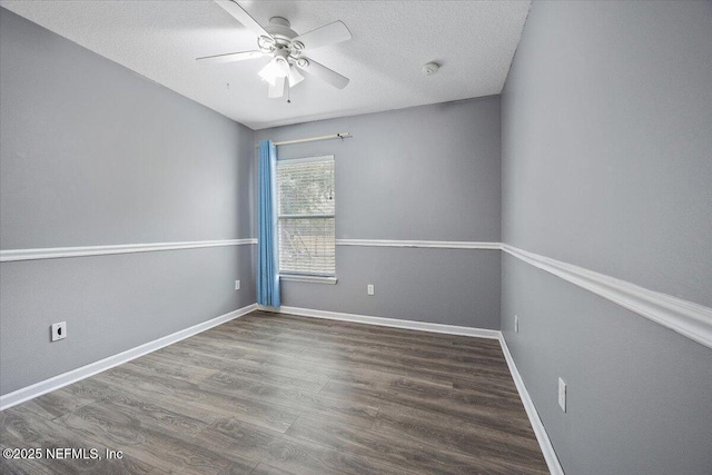 unfurnished room featuring ceiling fan, wood-type flooring, and a textured ceiling