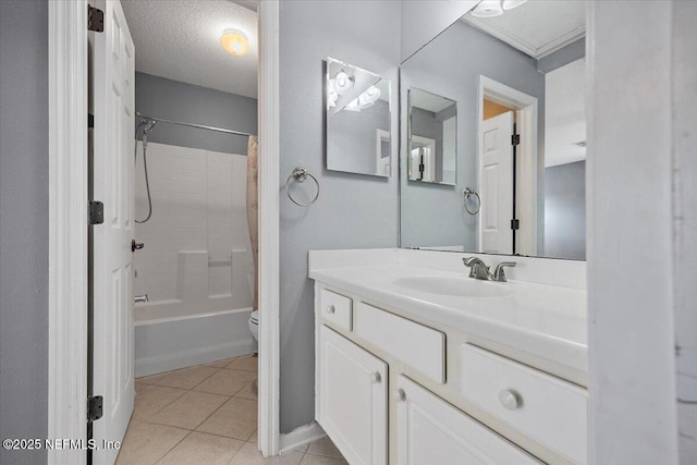 full bathroom featuring toilet, a textured ceiling, vanity, shower / bath combo with shower curtain, and tile patterned flooring