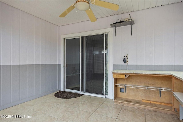 view of patio / terrace featuring ceiling fan