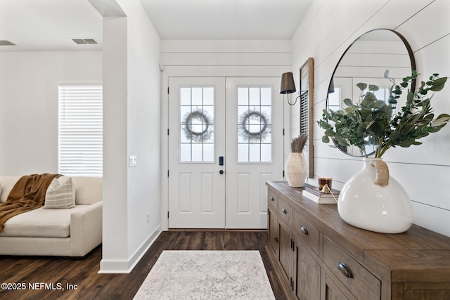 foyer featuring dark wood-type flooring