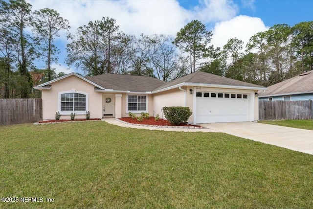 ranch-style house featuring a garage and a front yard