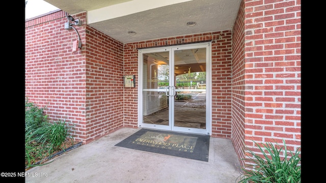 doorway to property with french doors