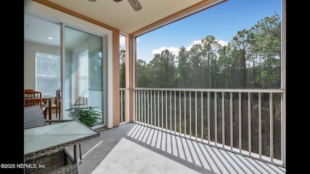 balcony featuring ceiling fan