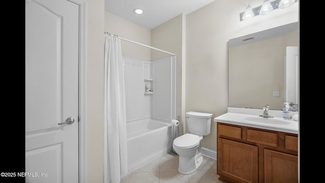 full bathroom featuring vanity, tile patterned floors, toilet, and shower / bath combo