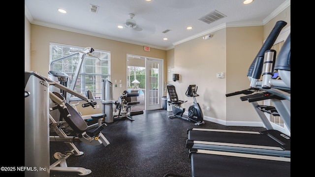 workout area featuring crown molding and french doors