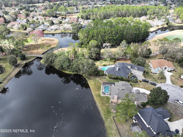 aerial view featuring a residential view and a water view
