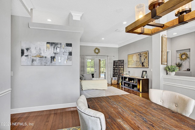 dining area with crown molding, french doors, recessed lighting, baseboards, and wood finished floors