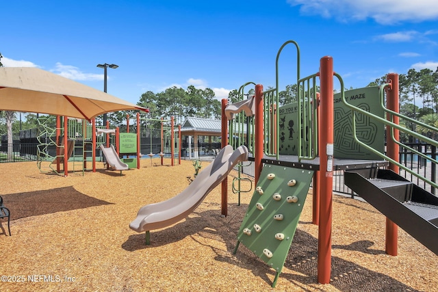 community playground featuring fence