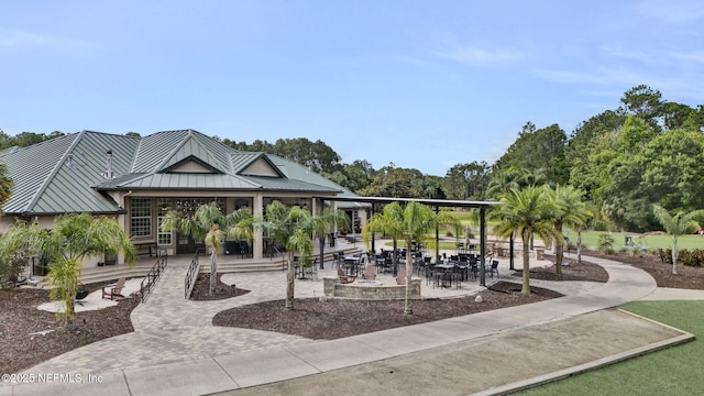 view of home's community featuring a patio area