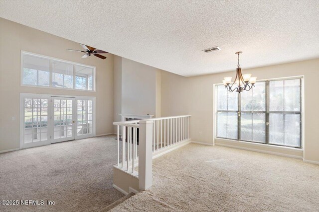 1706 Wood Hill Pl Unit 1706, Jacksonville, FL 32256 - unfurnished room featuring visible vents, plenty of natural light, and carpet