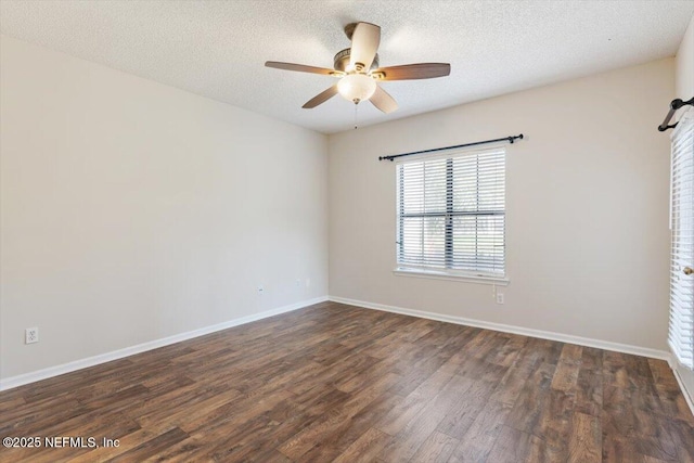 1706 Wood Hill Pl Unit 1706, Jacksonville, FL 32256 - spare room featuring a textured ceiling, ceiling fan, baseboards, and dark wood-style flooring