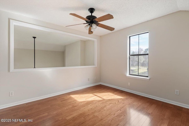 1706 Wood Hill Pl Unit 1706, Jacksonville, FL 32256 - unfurnished room with baseboards, ceiling fan, a textured ceiling, and wood finished floors