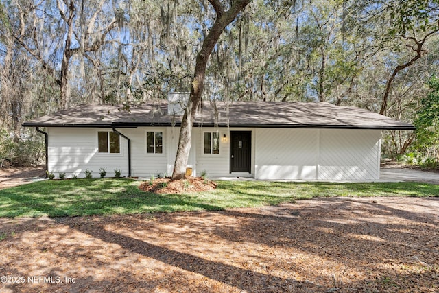 ranch-style house with a front yard