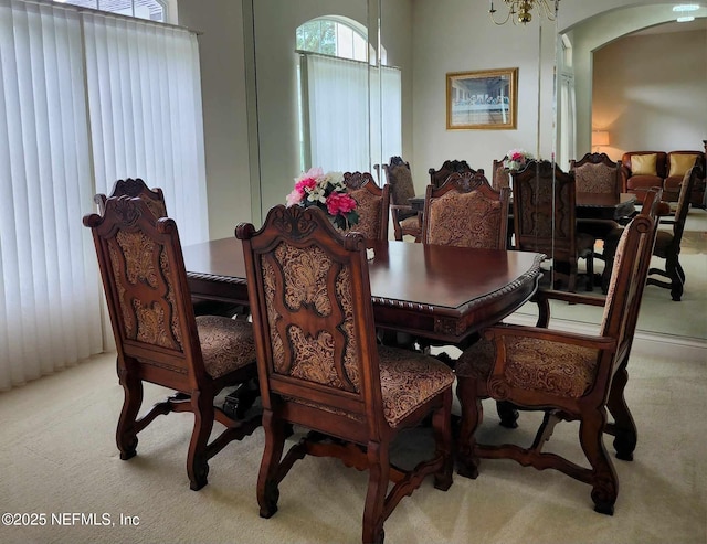 view of carpeted dining space