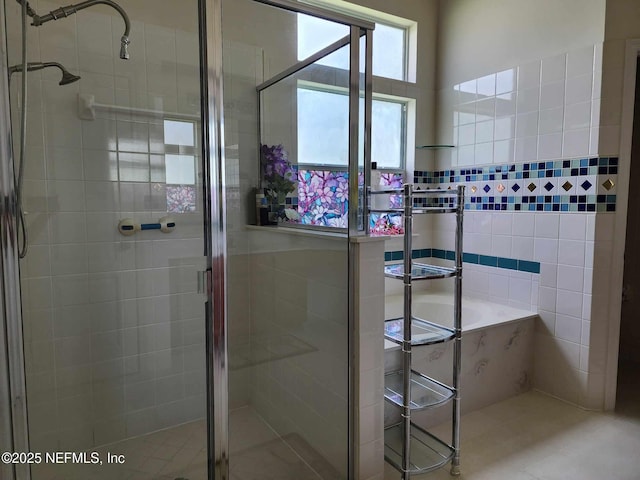 bathroom with a shower with shower door