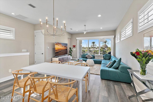 interior space with visible vents, wood finished floors, and recessed lighting