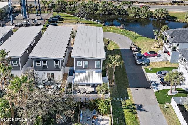 drone / aerial view featuring a water view