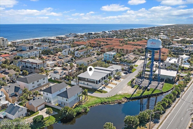 bird's eye view with a water view and a residential view