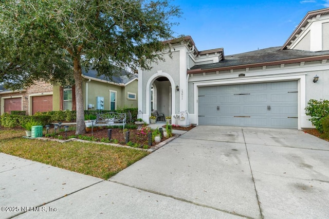 view of front of home with a garage