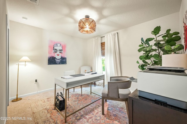 office with a textured ceiling