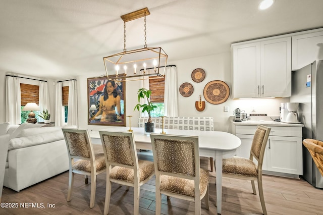 dining room featuring light wood-type flooring