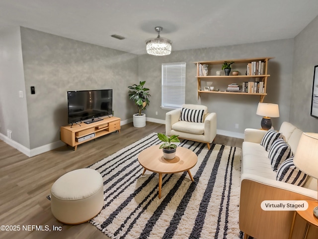 living room with dark hardwood / wood-style floors