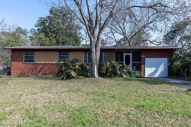 ranch-style house with a garage and a front lawn