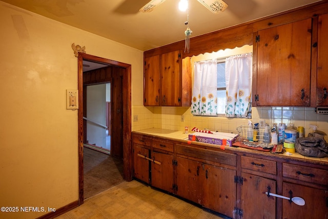 kitchen with backsplash and ceiling fan