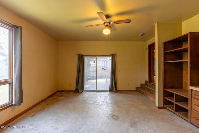 unfurnished room featuring ceiling fan