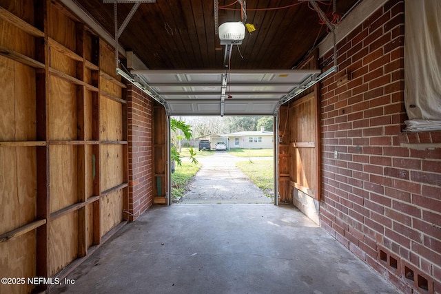 garage featuring a garage door opener