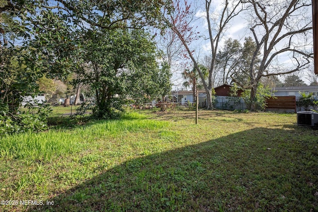 view of yard featuring central AC unit