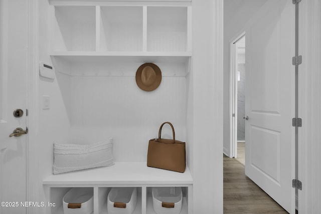 mudroom featuring dark wood-style floors