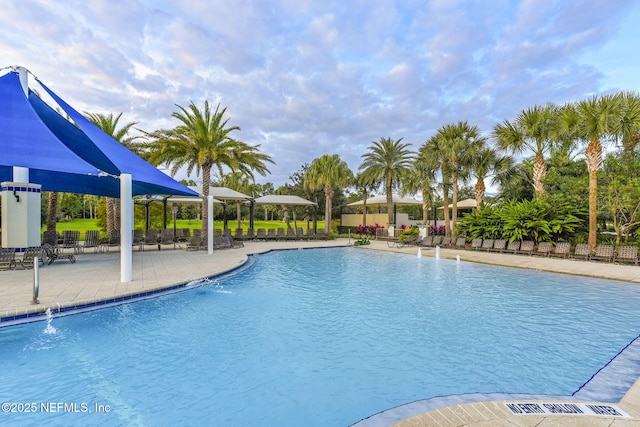 pool with a patio