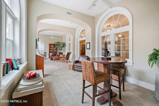 dining room featuring ceiling fan