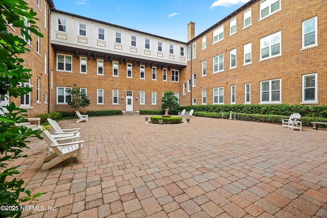 surrounding community featuring a patio area