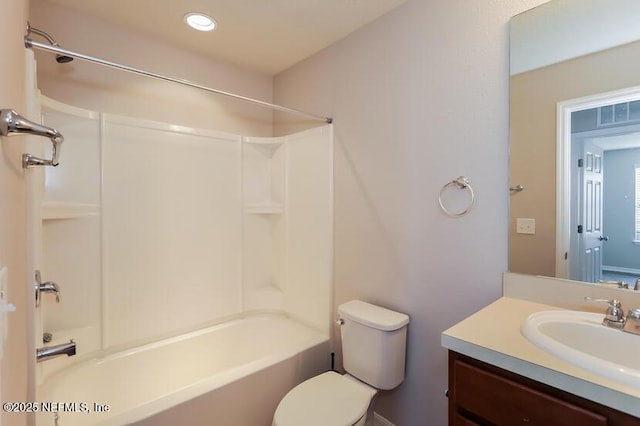 full bathroom featuring vanity, shower / tub combination, and toilet