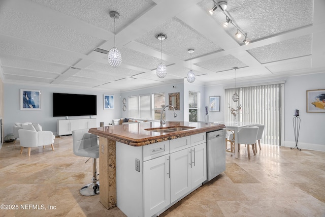 1387 Dunns Lake Dr, Jacksonville, FL 32218 - kitchen with sink, white cabinetry, dishwasher, an island with sink, and pendant lighting