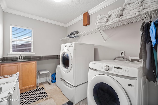 1387 Dunns Lake Dr, Jacksonville, FL 32218 - clothes washing area featuring cabinets, ornamental molding, sink, and independent washer and dryer