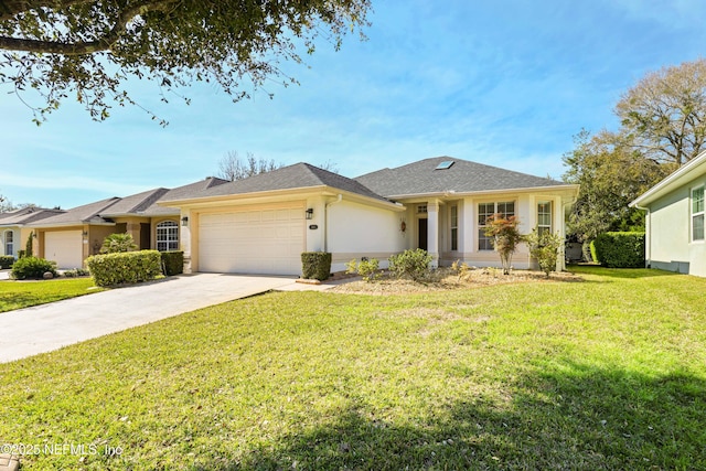 ranch-style home with an attached garage, driveway, a front yard, and stucco siding