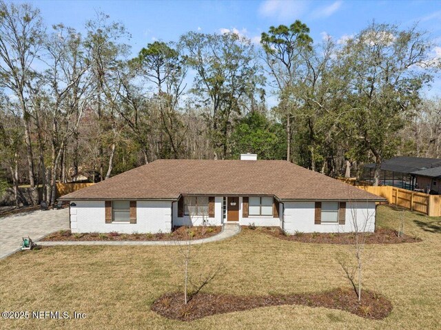 view of front of property with a front lawn