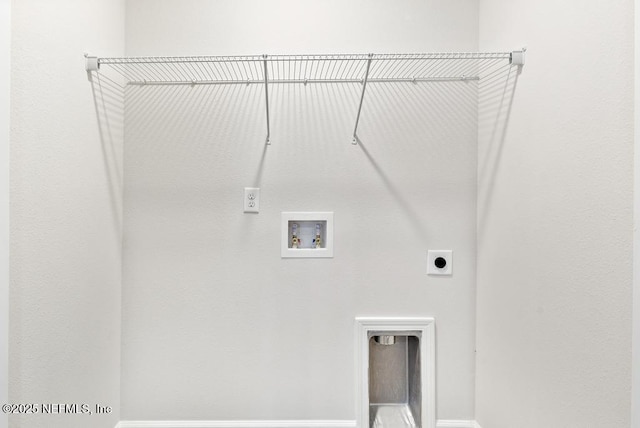 clothes washing area with hookup for a washing machine and hookup for an electric dryer