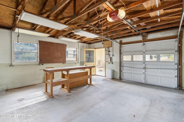 garage featuring a garage door opener