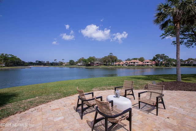 view of patio / terrace featuring a water view