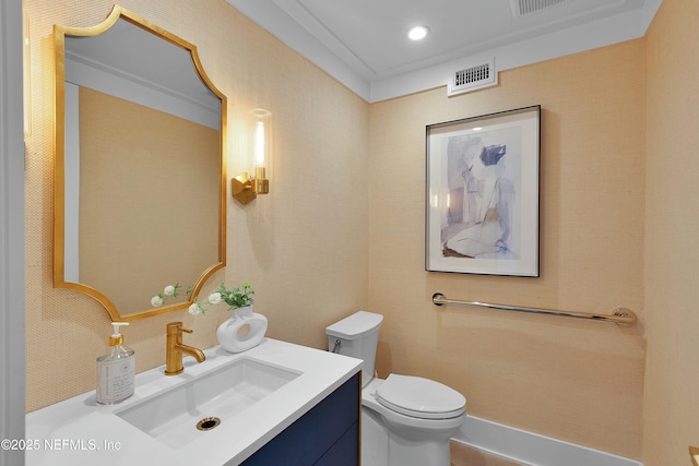 bathroom with visible vents, toilet, recessed lighting, and vanity