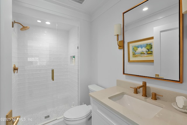 full bathroom with toilet, a shower stall, vanity, and recessed lighting
