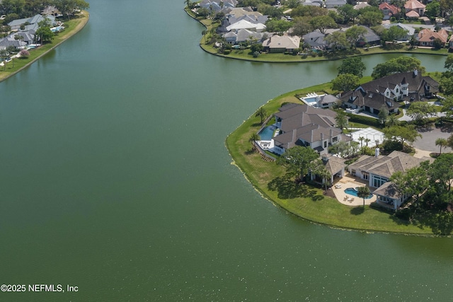 bird's eye view featuring a residential view and a water view